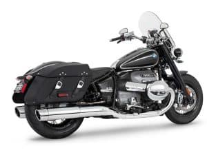 BMW cruiser motorcycle with black leather saddlebags, chrome accents, and a comfortable touring design.