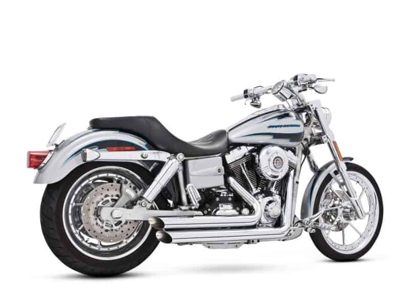 Amendment Exhaust - Chrome. Fits Dyna 1991-2005. Harley Davidson cruiser motorcycle in silver with black seat and chrome details.