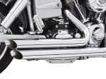 Shiny chrome motorcycle engine with dual exhaust pipes, close-up shot.