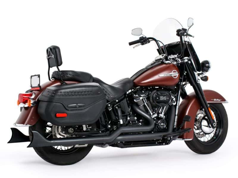 Harley-Davidson touring motorcycle with leather saddlebags and chrome accents.