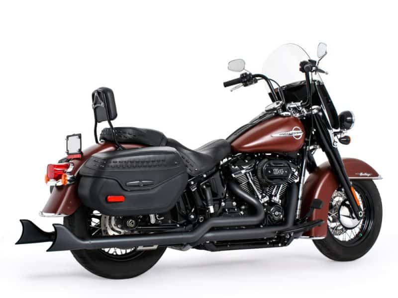 Harley Davidson touring motorcycle with black saddlebags and chrome accents, ideal for long-distance riding.