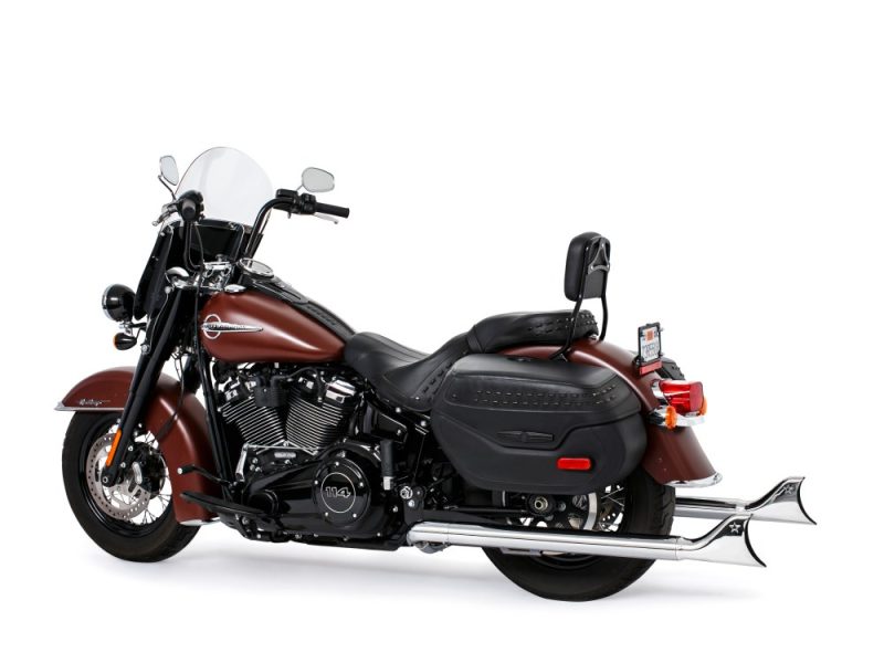 High-quality brown and black Harley-Davidson touring motorcycle with saddle bags and chrome exhausts for sale.