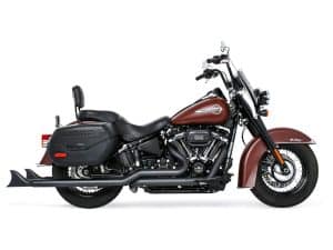 Black and brown Harley Davidson motorcycle with saddlebags, classic cruiser style, and custom detailing.