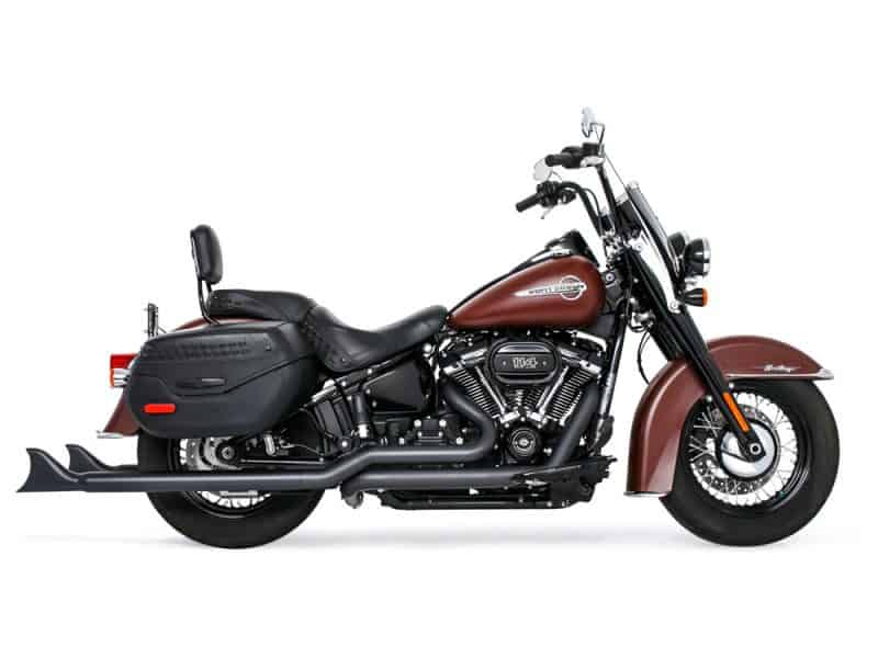 Black and brown Harley Davidson motorcycle with saddlebags, classic cruiser style, and custom detailing.