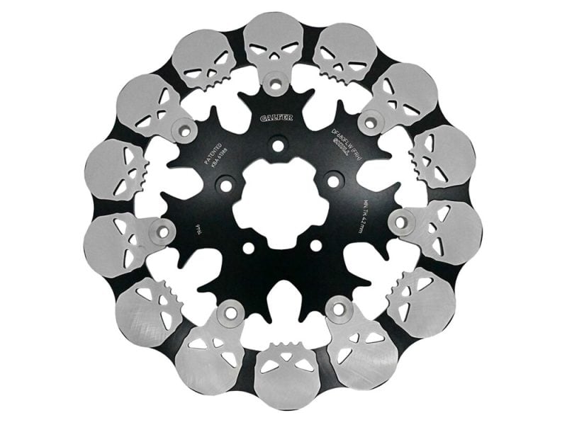 11.5in. Front Skull Floating Disc Rotor. Fits Big Twin & Sportster 2000-2014. Skull-themed motorcycle chainring for Revelry Cycles, durable and stylish bike upgrade.