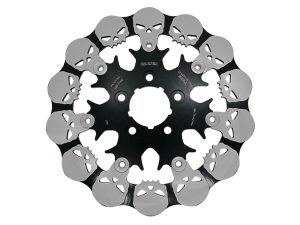 Skull-themed motorcycle sprocket with metal blades for custom bike builds.