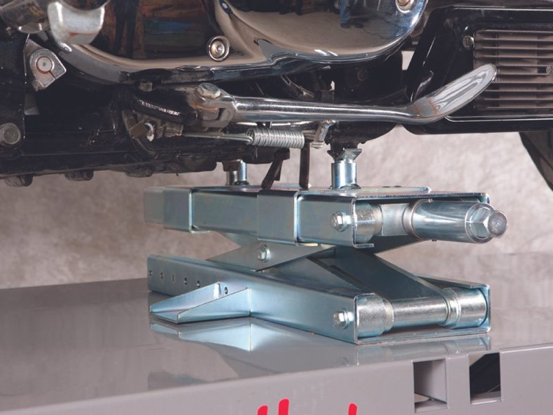 Heavy-duty motorcycle lift table for maintenance and repair at Revelry Motorcycles Australia.