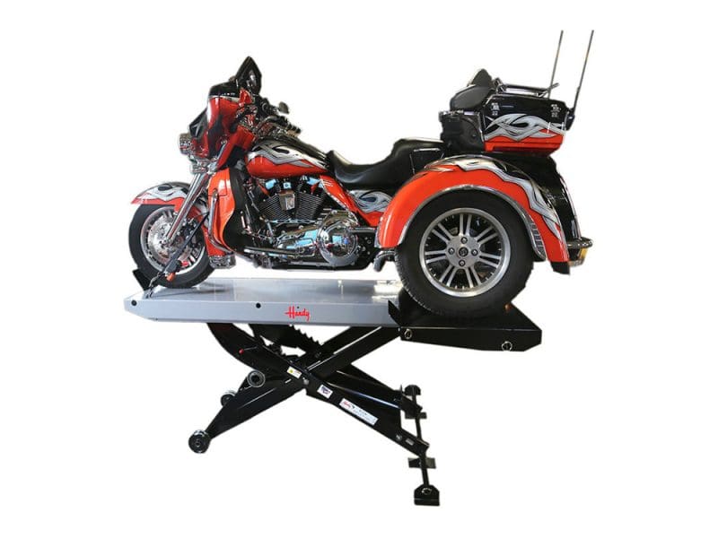 Motorcycle on hydraulic lift with trike conversion for Revelry Motorcycles Australia.
