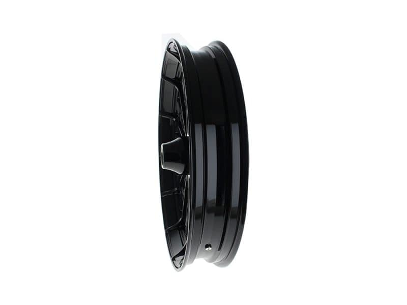 Black motorcycle wheel with alloy rim for Revelry Motorcycles.