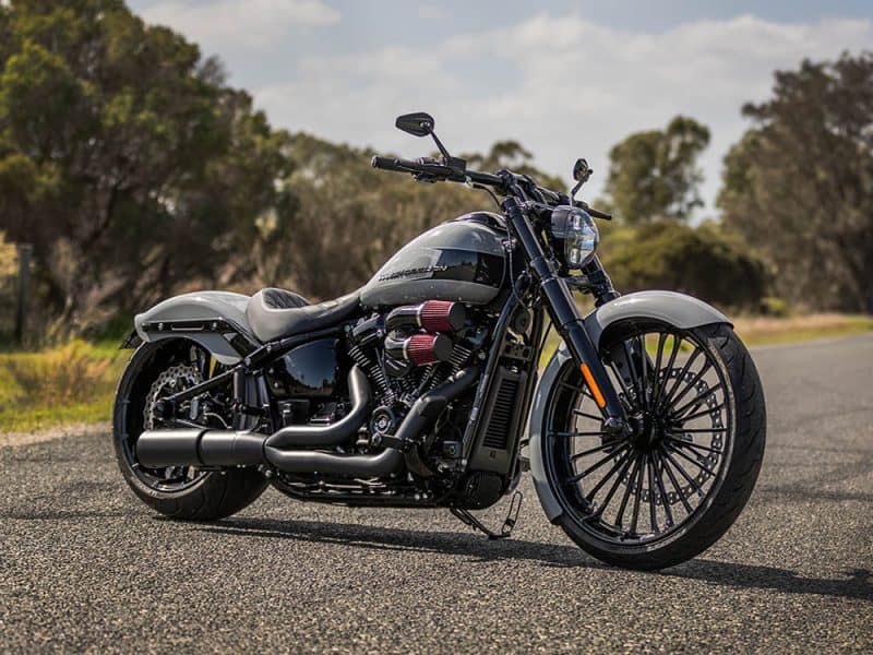V-twin cruiser motorcycle on Australian road, Revelry Motorcycles custom builds.