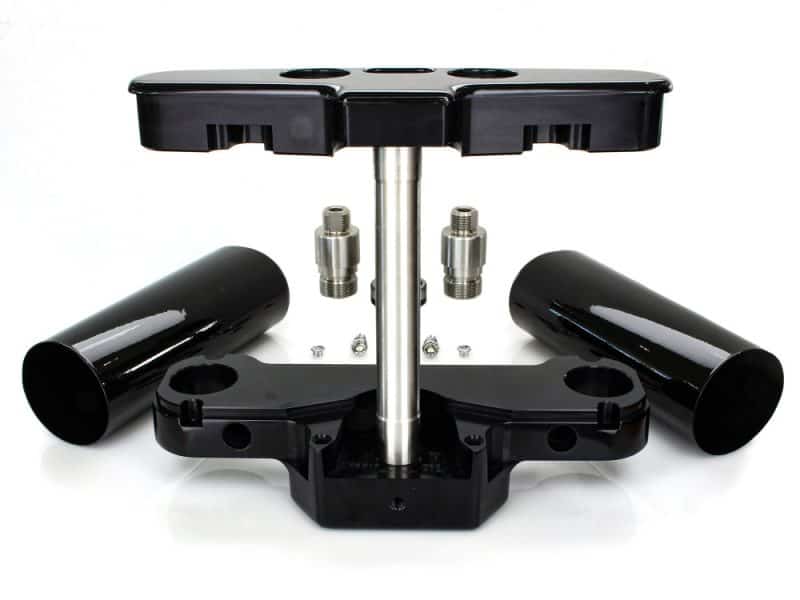 High-performance motorcycle triple tree and fork clamps for custom Revelry Motorcycles builds.