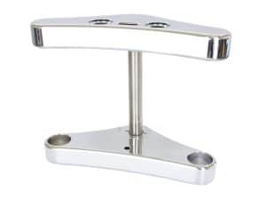 Polished motorcycle triple tree steering stem clamp for custom bikes.