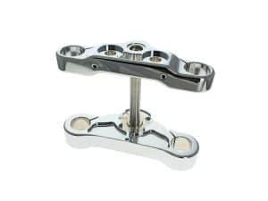 High-performance motorcycle shock linkage with polished chrome finish for enhanced ride stability.