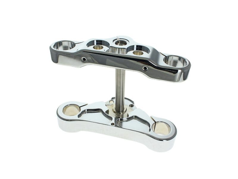 High-performance motorcycle shock linkage with polished chrome finish for enhanced ride stability.