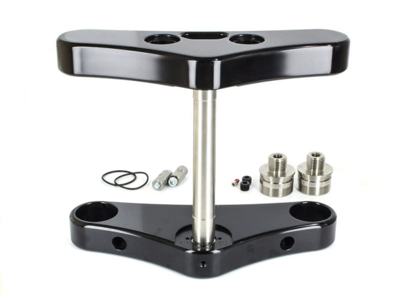 Solid motorcycle rear axle lift stand for Revelry Motorcycles repair and maintenance.
