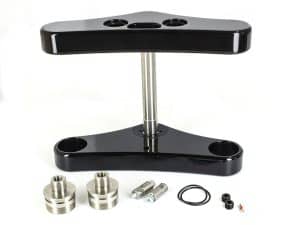 Black motorcycle steering stabiliser mount with adjustable components and hardware for enhanced bike control.