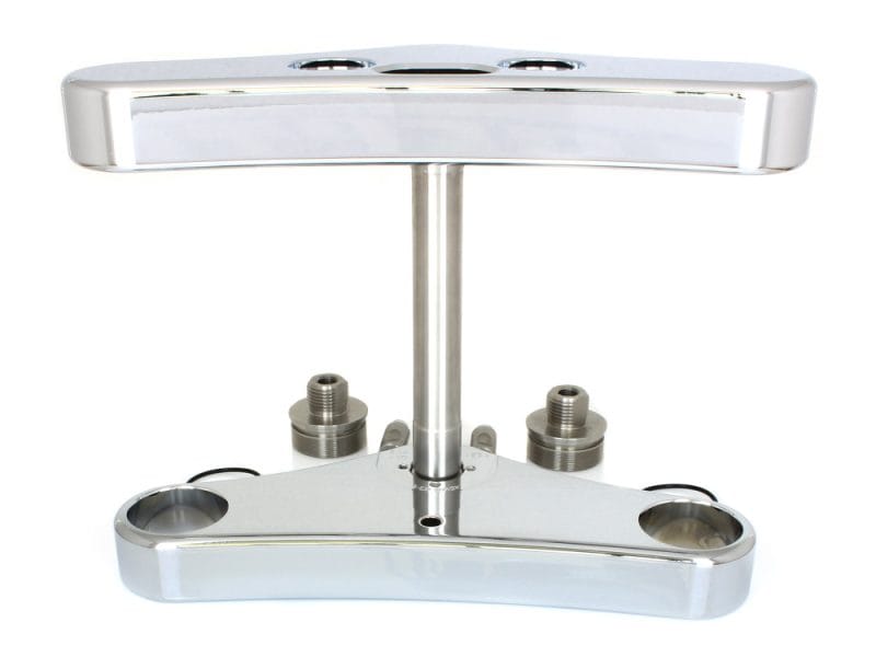 Stainless steel motorcycle triple tree assembly for enhanced bike handling and stability.