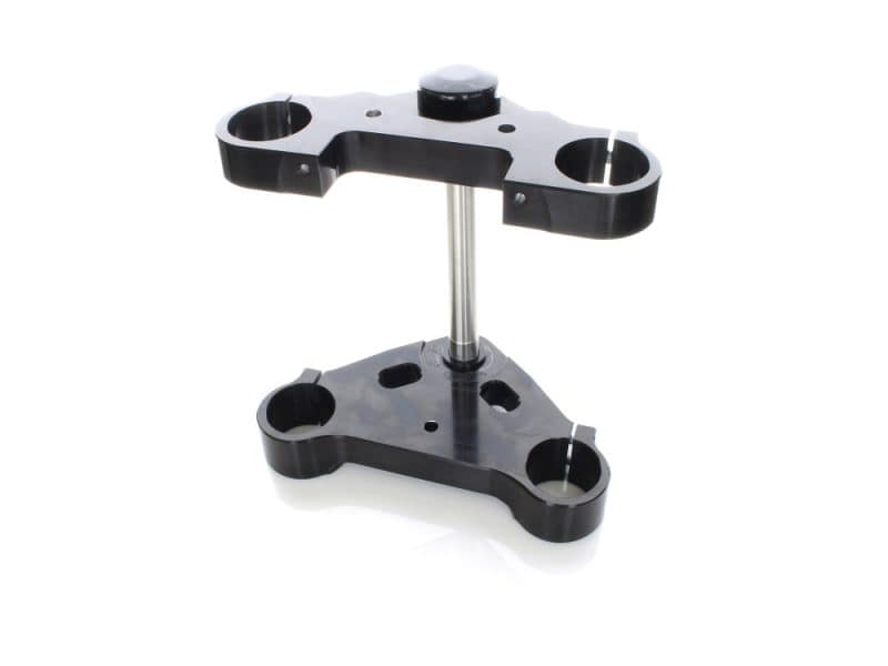 6 Degree Raked Triple Tree Kit - Black. Fits V-Rod 2012-2017 with OEM Inverted Front End & 23in. Wheel Upgrade. High-quality motorcycle triple tree clamp for Revelry Motorcycles, robust and durable.