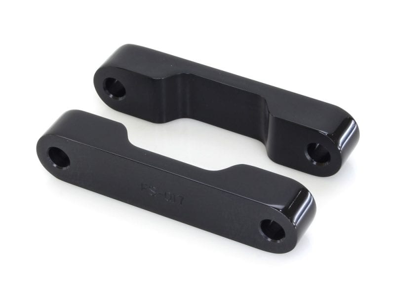 Heavy-duty motorcycle chain slider in black for improved durability | Revelry Motorcycles.