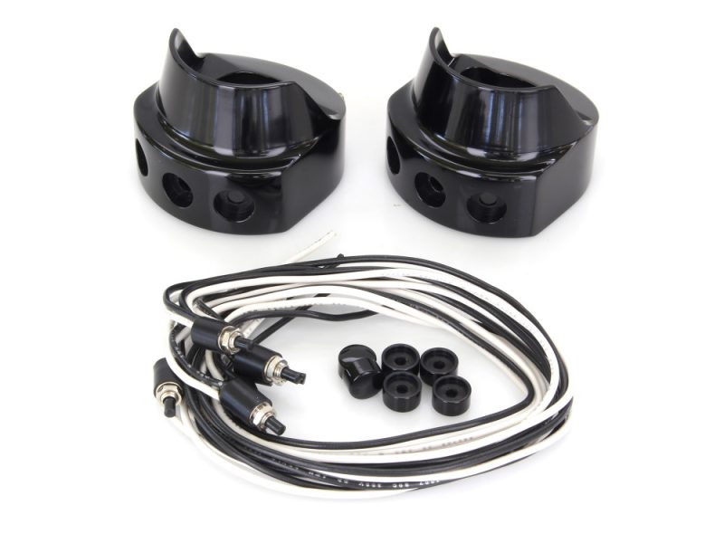 Black motorcycle handlebar risers and wiring harness for Revelry Motorcycles.