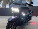 High-end touring motorcycle with advanced LED lighting and customised black finish.