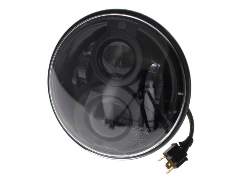 Bright LED motorcycle headlight with black housing for Revelry Motorcycles Australian bikes.
