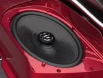 High-quality audio speaker on a red motorcycle for premium sound experience.