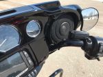 High-quality motorcycle audio system with speakers and controls on the dashboard of a Revelry Motorcycle.