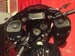 Motorcycle dashboard with GPS and controls at Revelry Motorcycles shop Australia.