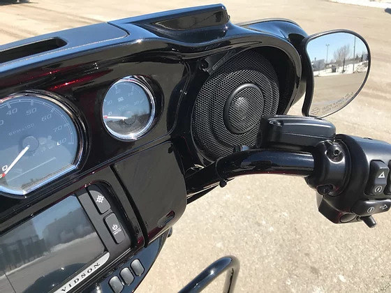 Wild Boar High-quality motorcycle dashboard with audio system and handlebar controls at Revelry Motorcycles.