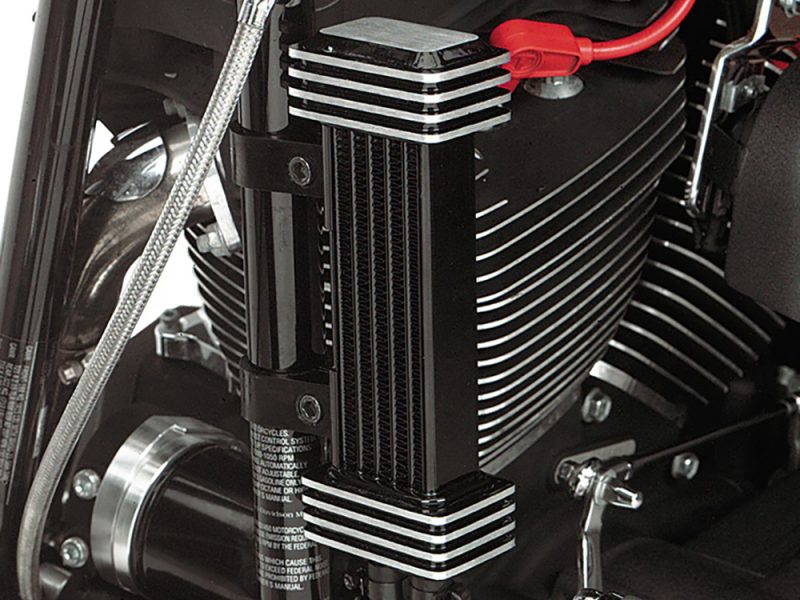 Aluminium motorcycle engine cooling fins and components at Revelry Motorcycles, focus on performance and customisation.