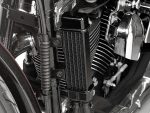 High-performance motorcycle radiator with black cooling fins, essential for optimal engine temperature management.