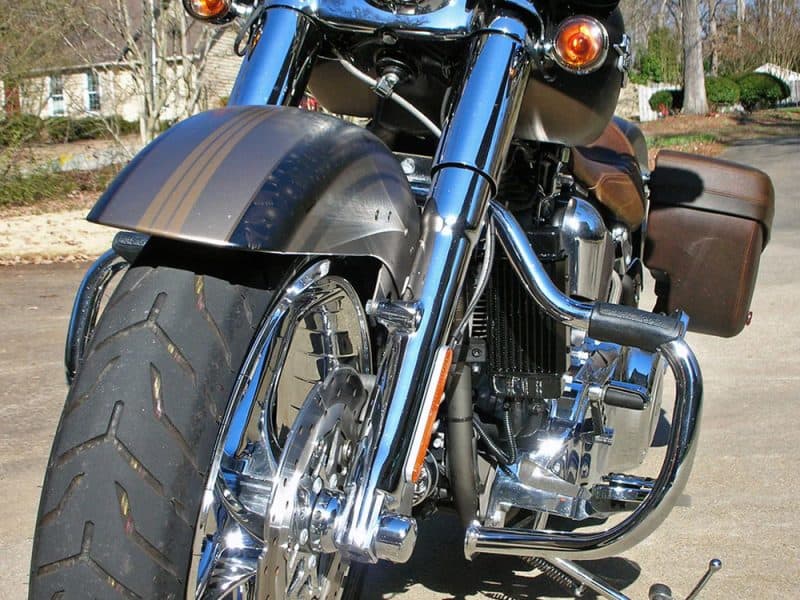 Stylish Harley-Davidson motorbike with chrome accents and leather saddle bags.