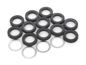 A set of black rubber seals with steel washers for motorcycle maintenance and repair.