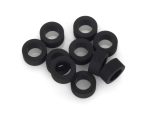 Rubber bushings for motorcycle suspension or frame parts.