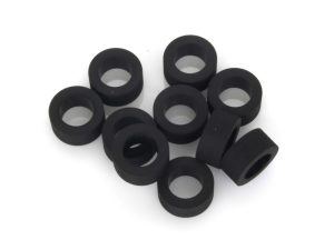 Rubber bushings for motorcycle suspension or frame parts.
