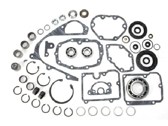 Transmission Rebuild Kit. Fits 5Spd Big Twin Late 1984-1990 with Fine Spline Main Drive Sprocket. Gasket and bearing set for motorcycle engine repair or maintenance.