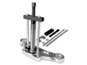 Bicycle steering head bearing press tool for motorcycle maintenance and repair.
