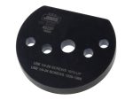 Black motorcycle spacer with multiple holes, suitable for vintage and custom bikes.
