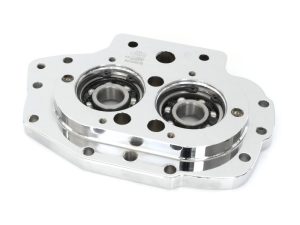 Aluminium motorcycle engine component with dual ball bearings, chrome finish, flat mounting surface.