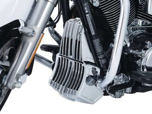 Sleek chrome motorcycle engine with stylish cooling fins and black accents.