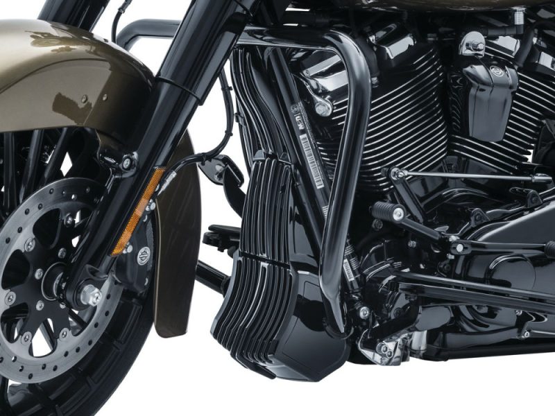 Harley-Davidson motorcycle engine with black and chrome finish, showcasing high-performance parts.