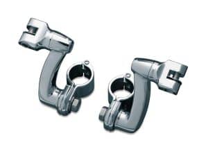 Polished chrome motorcycle handlebar clamps and brackets for custom bikes.