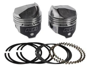 High-performance motorcycle pistons with piston rings for Revelry Motorcycles repairs and upgrades.