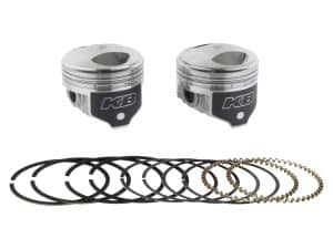 Piston kits with connecting rings, essential for motorcycle engine rebuilds.