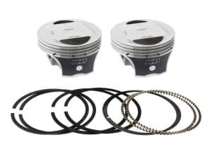 High-performance motorcycle pistons with piston rings and bearings for Revelry Motorcycles.