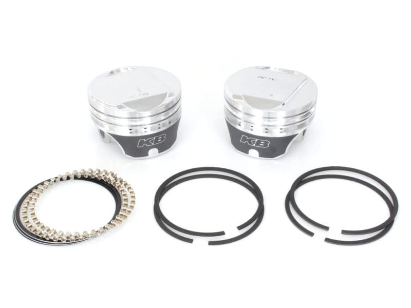 +.010in. Dome Top Pistons with 9.5:1 Compression Ratio. Fits Big Twin 1984-1999. Piston and piston ring set for motorcycle engine rebuilds at Revelry Cycles, Australia.