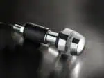 Sleek motorcycle motorcycle handlebar end cap with chrome finish and transparent accents.