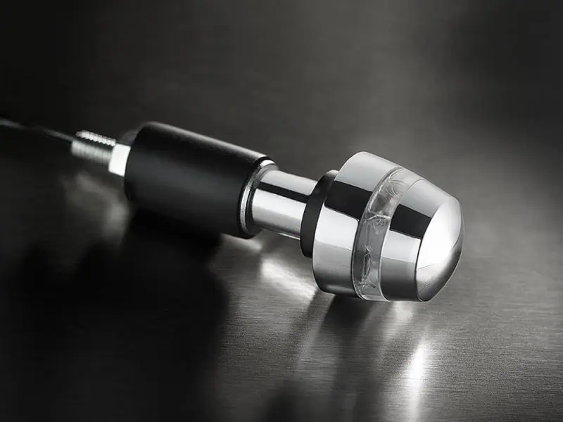 Sleek motorcycle motorcycle handlebar end cap with chrome finish and transparent accents.