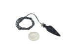 Tiny black motorcycle turn signal with wiring and connector, compact vehicle lighting part.